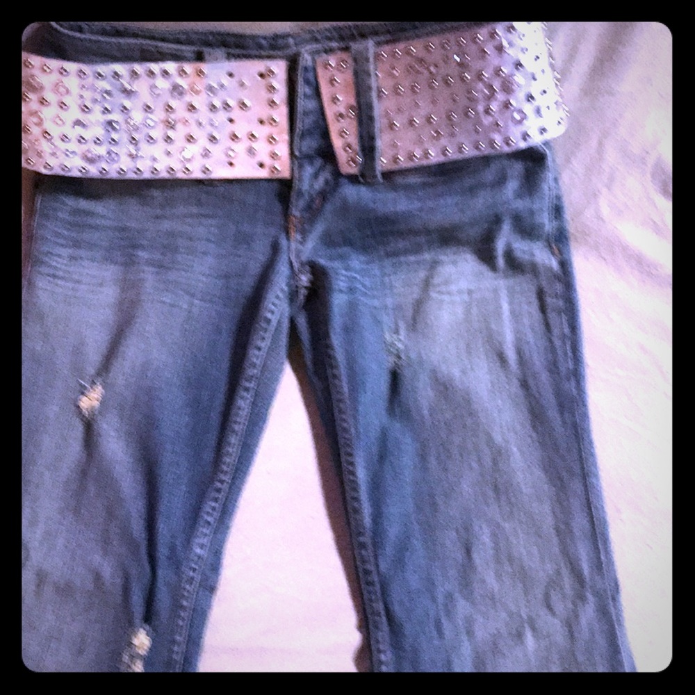 Boot cut jeans with silver belt